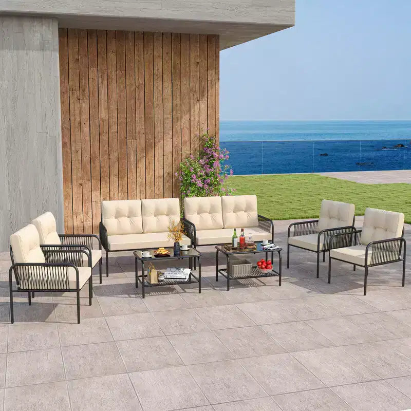 Ensemble de mobilier de patio Costway 8 pièces avec causeuse, table basse en verre trempé et coussins moelleux