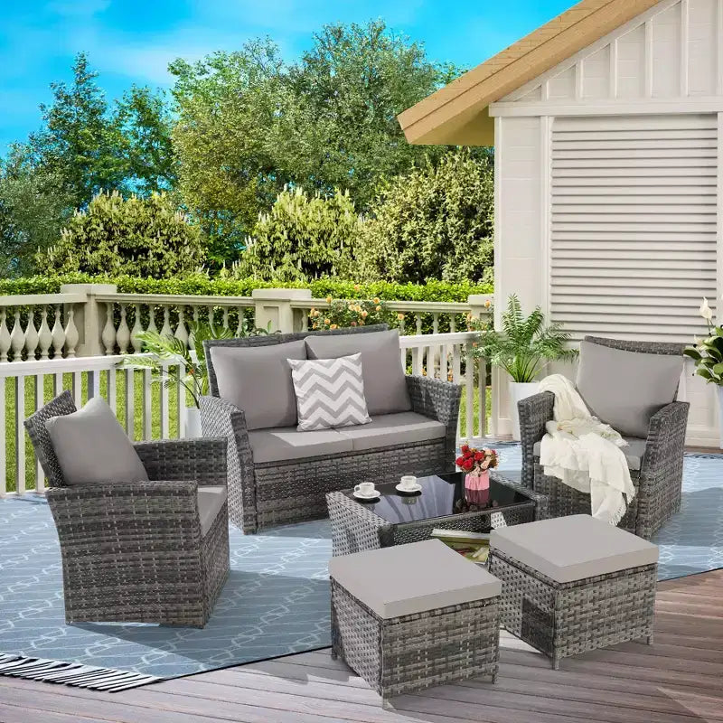 Salons de jardin 6 places en osier avec ottoman et table basse en verre trempé