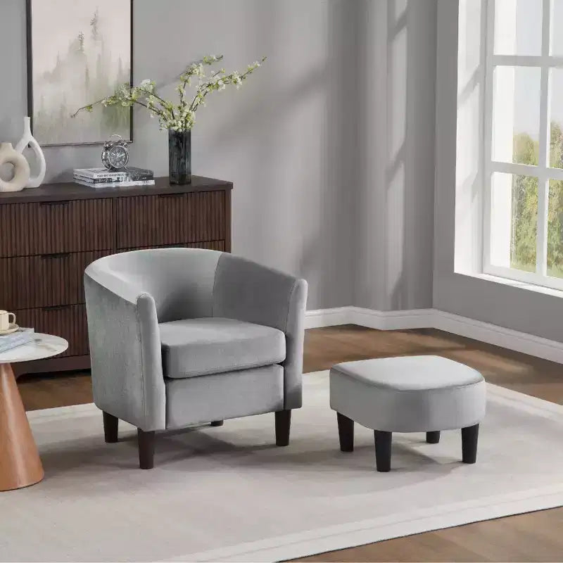 Fauteuil d'appoint moderne Bestier gris en velours avec ottoman, dossier en U et assise épaisse et rembourrée