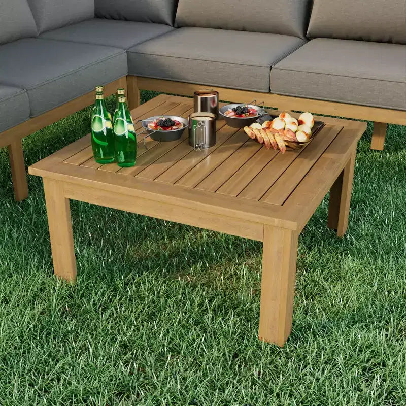 Ensemble de canapés de jardin 4 pièces en bois d'acacia Merax avec table basse et pieds réglables
