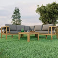 Merax 4-Piece Acacia Wood Outdoor Sofa Set with a Coffee Table and Adjustable Foot Pads