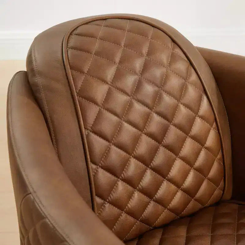 Fauteuil Art Leon en cuir avec design matelassé pour un confort intemporel