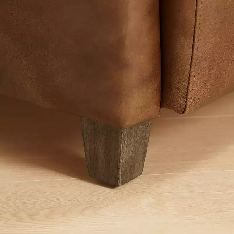 Fauteuil Art Leon en cuir avec design matelassé pour un confort intemporel