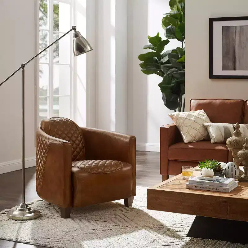 Fauteuil Art Leon en cuir avec design matelassé pour un confort intemporel