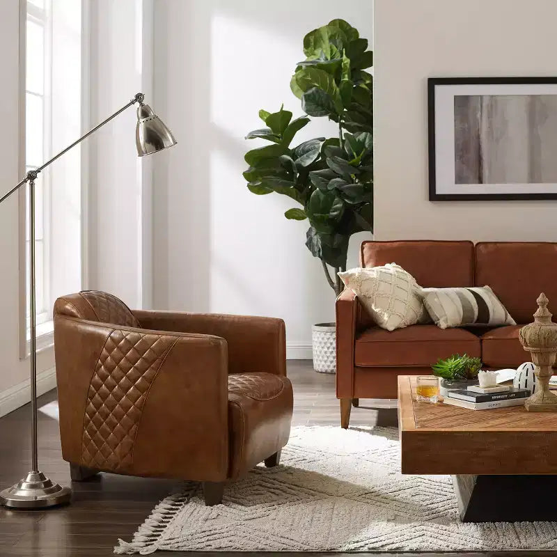 Fauteuil Art Leon en cuir avec design matelassé pour un confort intemporel