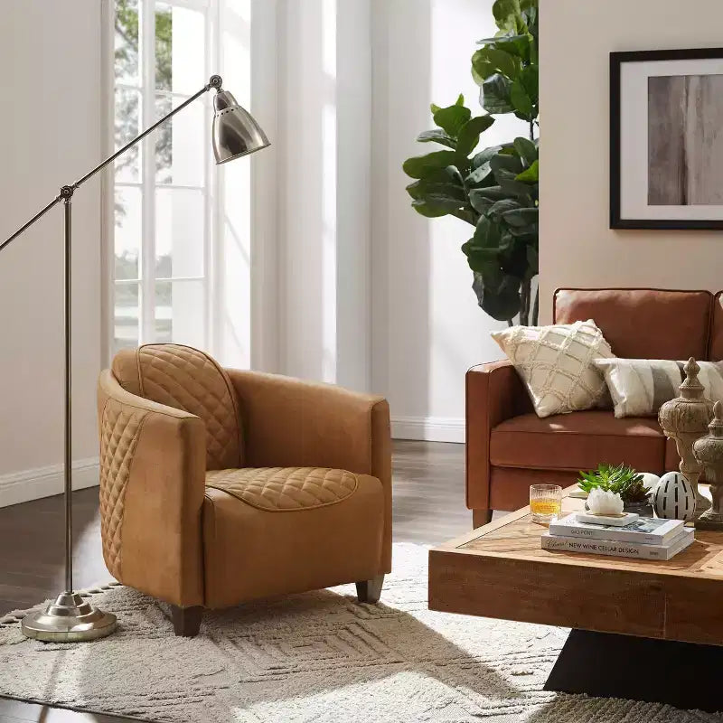 Fauteuil Art Leon en cuir avec design matelassé pour un confort intemporel