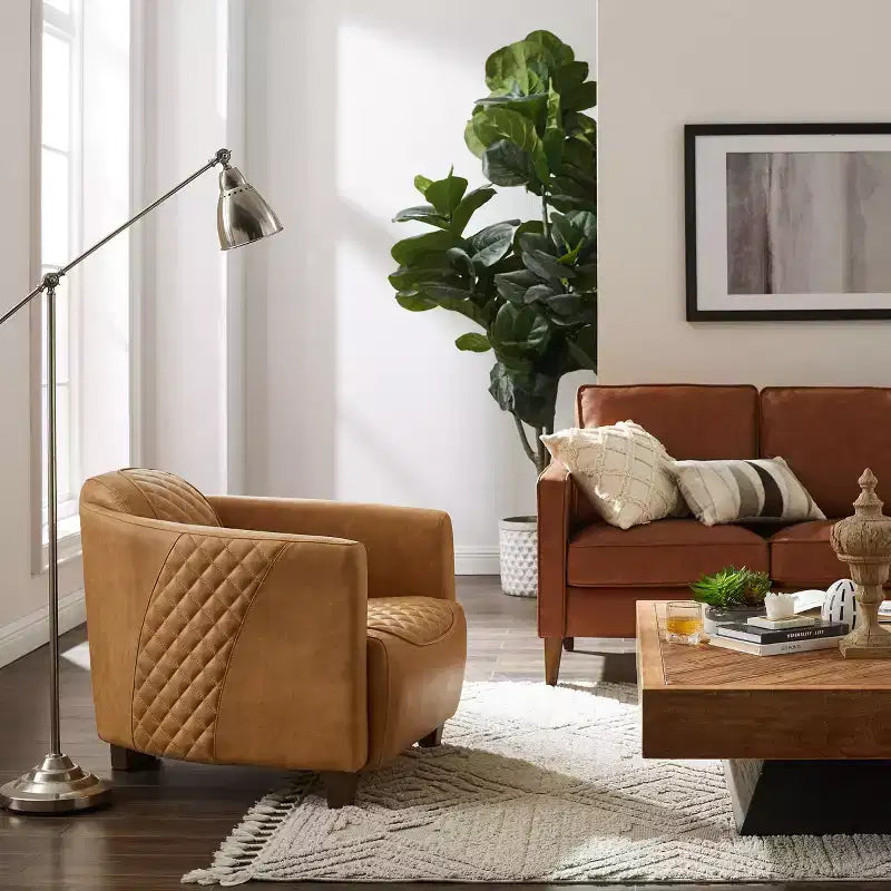 Fauteuil Art Leon en cuir avec design matelassé pour un confort intemporel