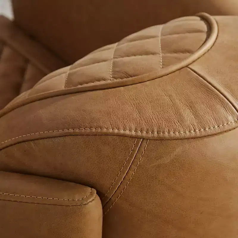 Fauteuil Art Leon en cuir avec design matelassé pour un confort intemporel