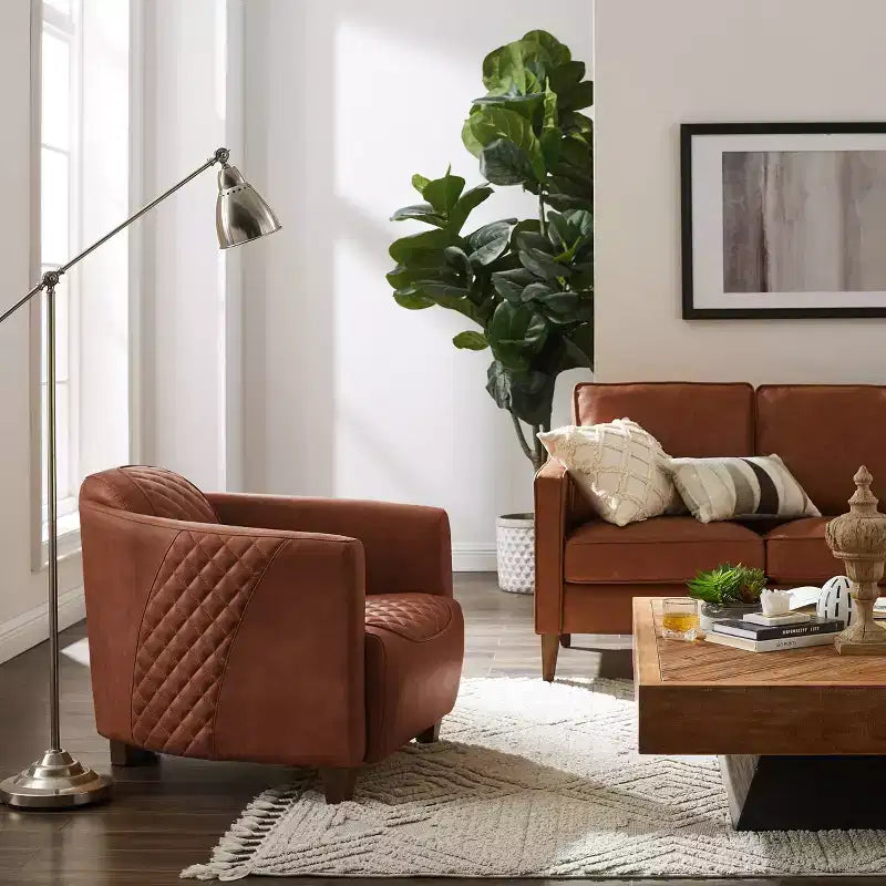 Fauteuil Art Leon en cuir avec design matelassé pour un confort intemporel