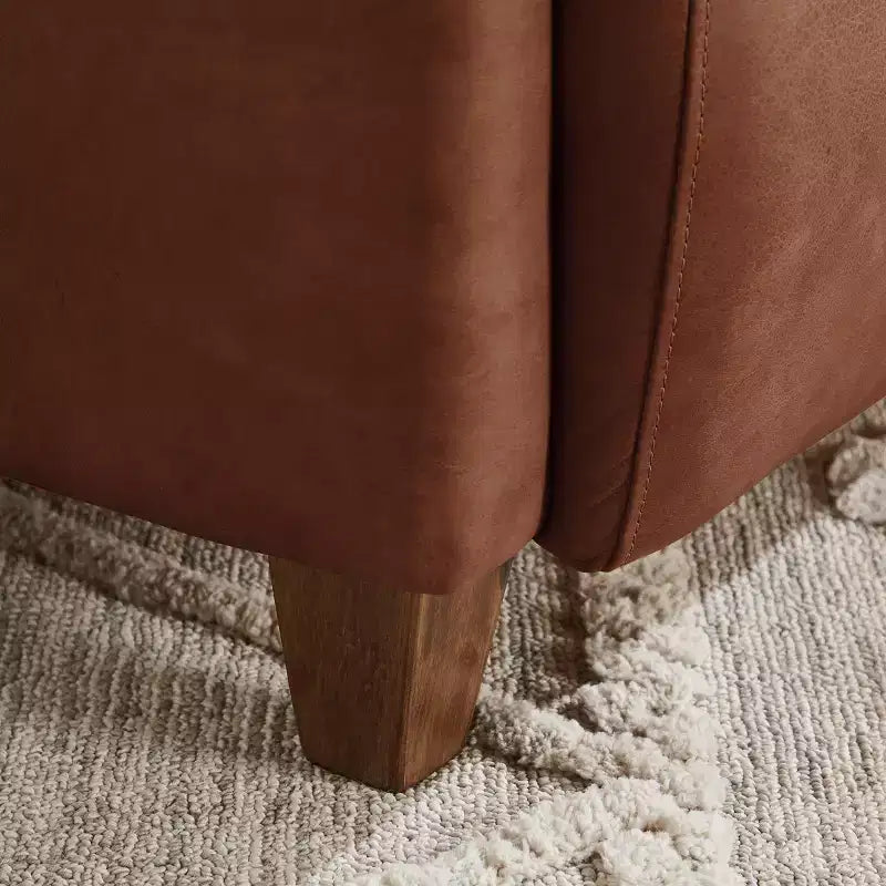 Fauteuil Art Leon en cuir avec design matelassé pour un confort intemporel