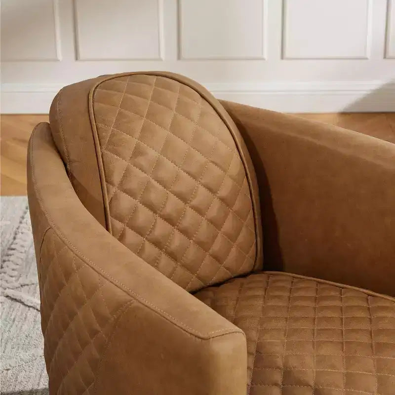Fauteuil Art Leon en cuir avec design matelassé pour un confort intemporel