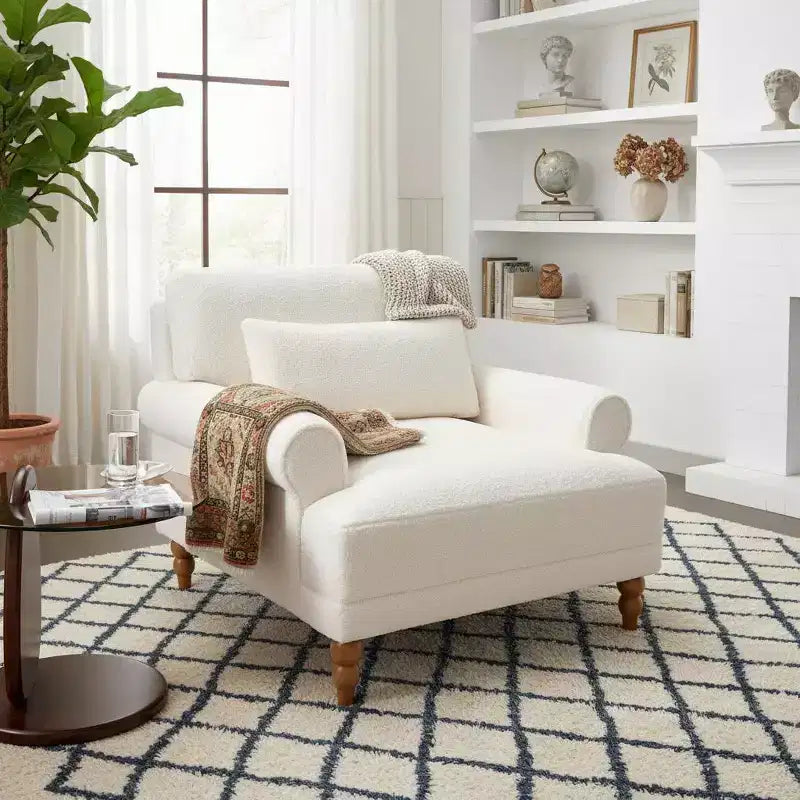 Fauteuil d'appoint Polibi surdimensionné avec accoudoirs circulaires et coussin lombaire