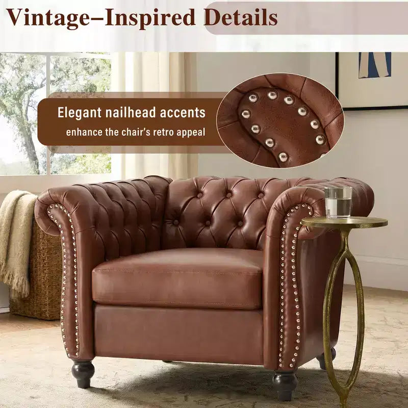 Fauteuil club Chesterfield Zeus et Ruta avec accoudoirs volutes, garniture cloutée et pieds en bois massif