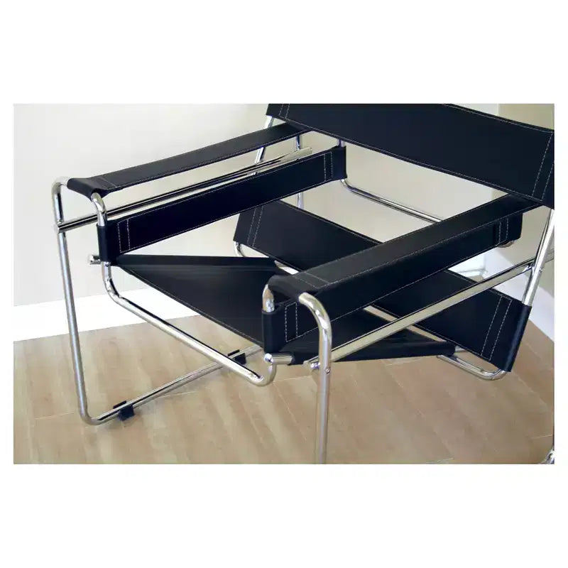 Fauteuil d'appoint Jericho Leather noir - Baxton Studio : revêtement en similicuir, cadre en acier, aucun assemblage requis