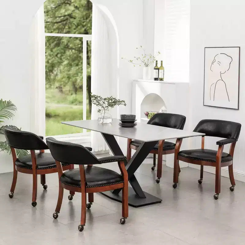 Fauteuil Dillon avec roulettes en cuir végétalien noir Breighton Home Take a Seat