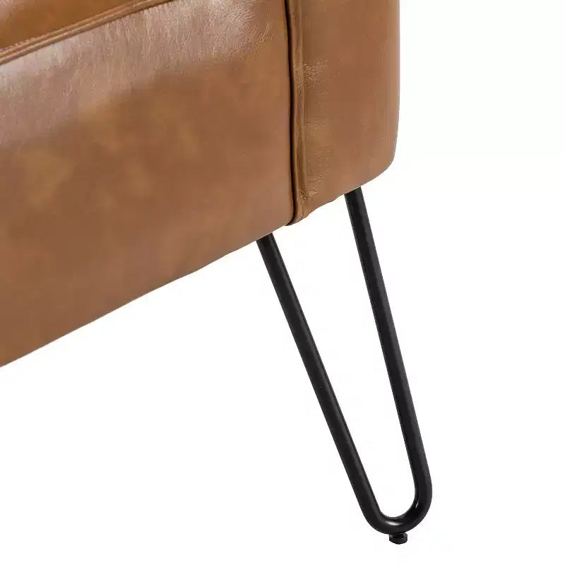 Eustacio Comtemporain Fauteuil d'appoint en similicuir capitonné avec pieds en métal | Karat Home