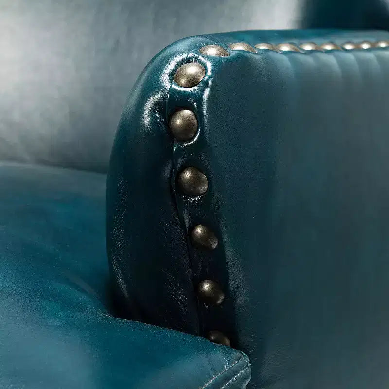 Fauteuil à oreilles en similicuir végane Jorge avec clous décoratifs pour salon et chambre | Karat Home