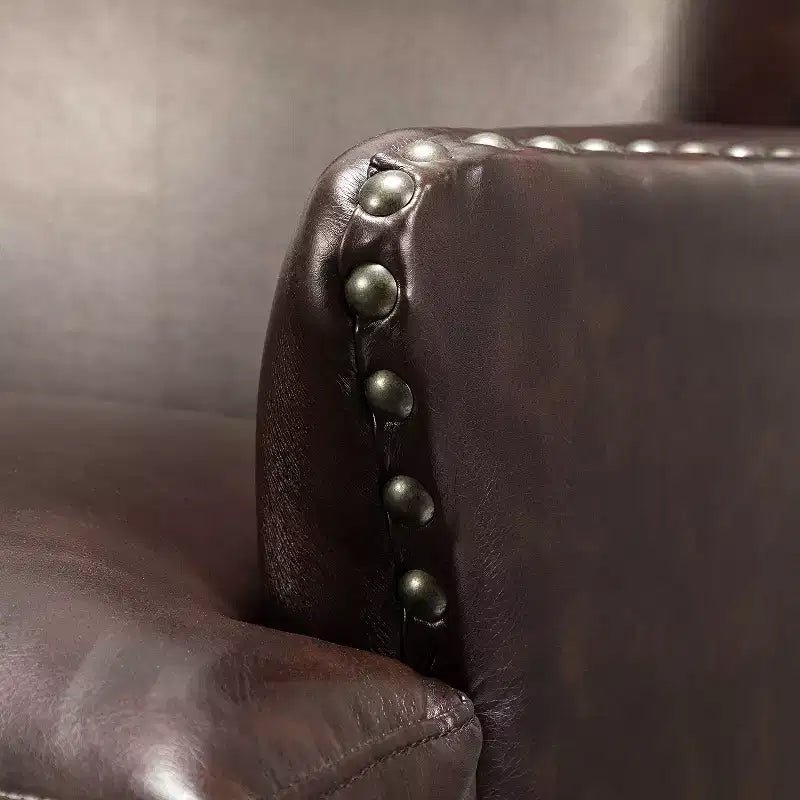 Fauteuil à oreilles en similicuir végane Jorge avec clous décoratifs pour salon et chambre | Karat Home