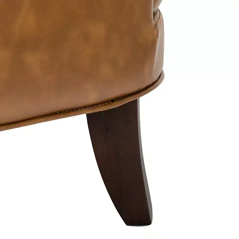Fauteuil à oreilles en similicuir végane Jorge avec clous décoratifs pour salon et chambre | Karat Home