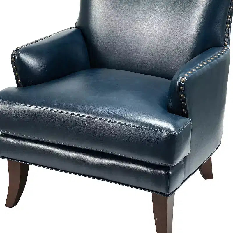 Fauteuil à oreilles en similicuir végane Jorge avec clous décoratifs pour salon et chambre | Karat Home