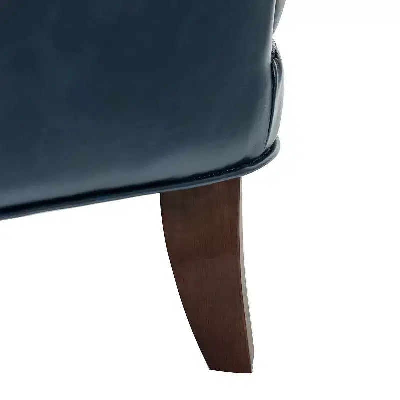 Fauteuil à oreilles en similicuir végane Jorge avec clous décoratifs pour salon et chambre | Karat Home