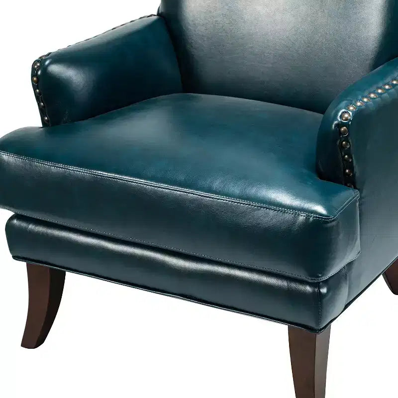 Fauteuil à oreilles en similicuir végane Jorge avec clous décoratifs pour salon et chambre | Karat Home