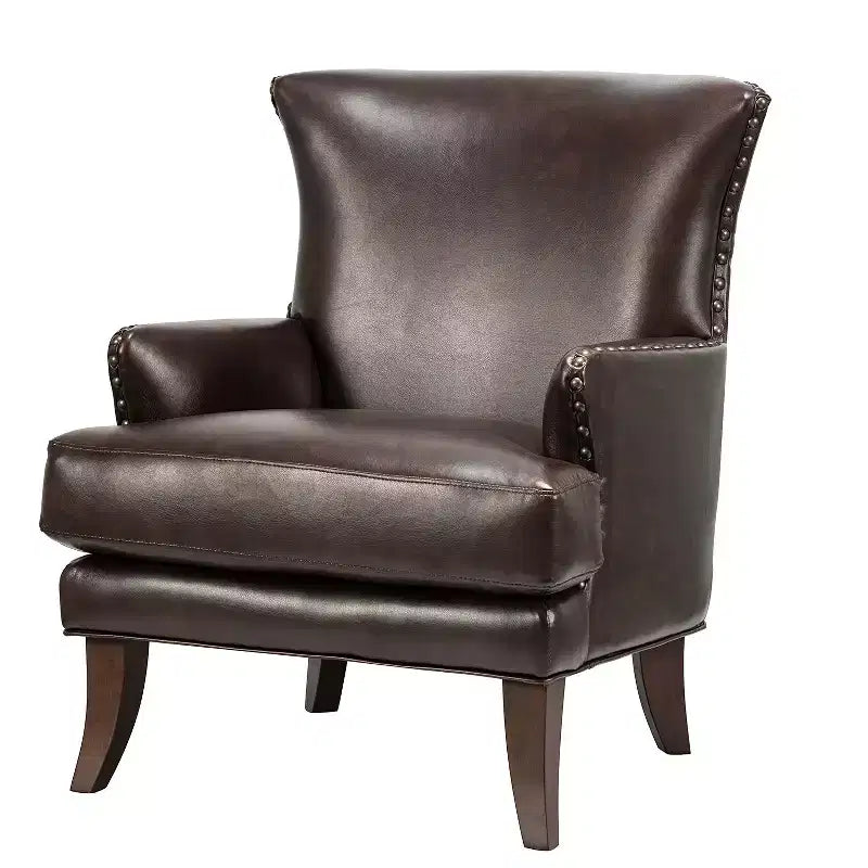 Fauteuil à oreilles en similicuir végane Jorge avec clous décoratifs pour salon et chambre | Karat Home