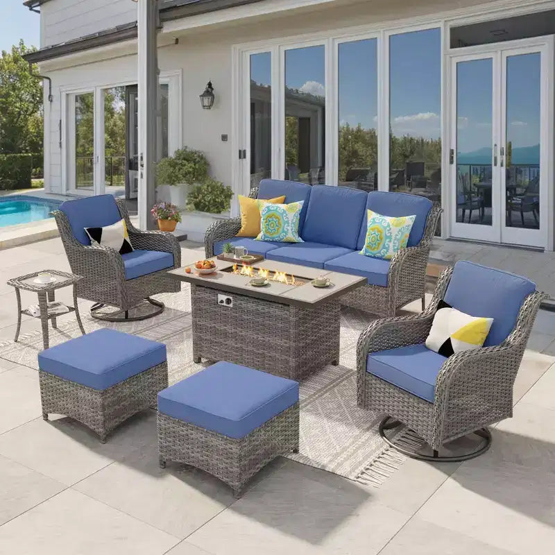 Ensemble de conversation de 7 meubles de patio Ovios Orlando en osier marron avec foyer rectangulaire, fauteuils pivotants et coussins