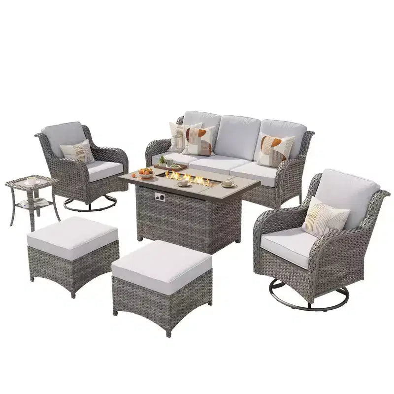 Ensemble de conversation de 7 meubles de patio Ovios Orlando en osier marron avec foyer rectangulaire, fauteuils pivotants et coussins